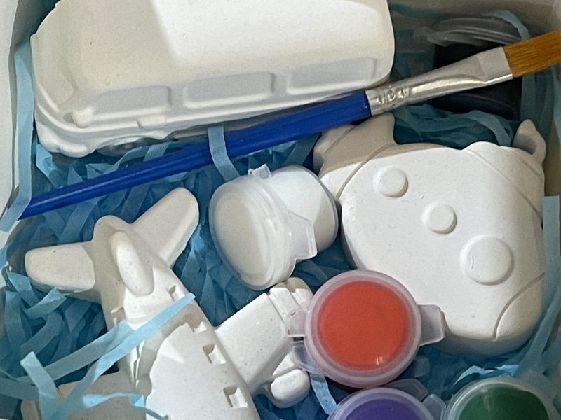 A Creative Kids gift box with plaster vehicles, paints and brush
