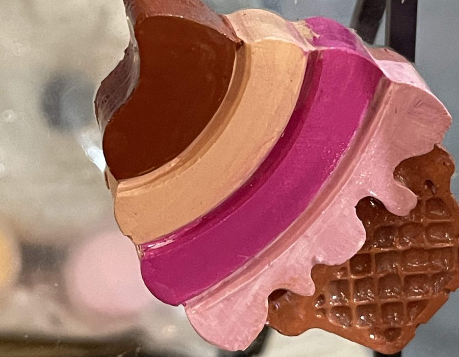 A finished hand-painted ice cream cone piece